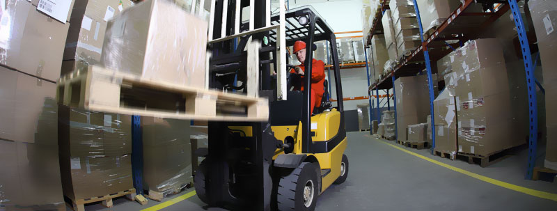 Forklift in warehouse